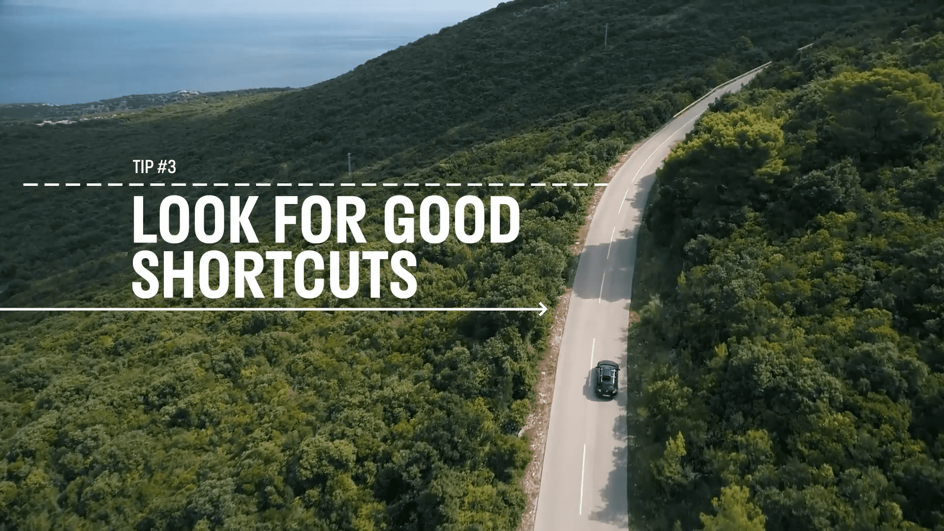 Image of a car driving on a road through a forested area with white text that reads Tip 3 Look for good shortcuts. How to scale up video production so you can make more content.